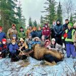 Students from Nikiski Middle/High School and Kenai Middle School join Jesse Bjorkman, Ken Felchle and volunteers from the Kenai Peninsula Chapter of Safari Club International on an educational moose hunt in Nikiski, Alaska, on Saturday, Dec. 2, 2023. (Photo provided by Jesse Bjorkman)