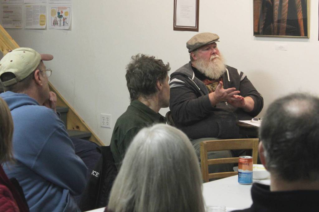 Larry Opperman (second from right) speaks during a community meeting about retrofitting homes to be more energy efficient at the Cook Inletkeeper Community Action Studio on Tuesday, Dec. 5, 2023, in Soldotna, Alaska. (Ashlyn OHara/Peninsula Clarion)