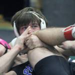 Soldotnas Hunter Bras works to get nearfall points against Palmers Cody Vansiegman during the 145-pound final of the Northern Lights Conference Championships on Saturday, Dec. 9, 2023, at Colony High School in Palmer, Alaska. (Photo by Jeremiah Bartz/Frontiersman)