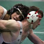 Soldotnas Bowen Korth maintains a grasp on teammate Collin Peck during the 171-pound final of the Northern Lights Conference Championships on Saturday, Dec. 9, 2023, at Colony High School in Palmer, Alaska. (Photo by Jeremiah Bartz/Frontiersman)
