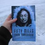 A copy of William L. Iġġiaġruk Hensleys Fifty Miles from Tomorrow is held outside the Peninsula Clarion building on Tuesday, Dec. 12, 2023 in Kenai, Alaska. (Ashlyn OHara/Peninsula Clarion)