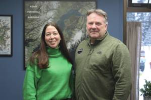 Ashlyn OHara/Peninsula Clarion
Cassidi Cameron, left, and Tim Dillon stand in Dillons office at the Kenai Peninsula Economic Development District on Dec. 12 near Kenai.