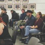Audience members listen to Iris Fontana, of the Satanic Temple, deliver an invocation during a Kenai Peninsula Borough Assembly meeting on Tuesday Soldotna. Fontana was the last person to deliver an assembly invocation before a new borough policy, which says only borough volunteer chaplains may deliver the invocation, takes effect. (Ashlyn OHara/Peninsula Clarion)