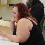 Iris Fontana, of the Satanic Temple, delivers an invocation during a Kenai Peninsula Borough Assembly meeting on Tuesday, Dec. 12, 2023, in Soldotna, Alaska. Fontana was the last person to deliver an assembly invocation before a new borough policy, which says only borough volunteer chaplains may deliver the invocation, takes effect. (Ashlyn OHara/Peninsula Clarion)