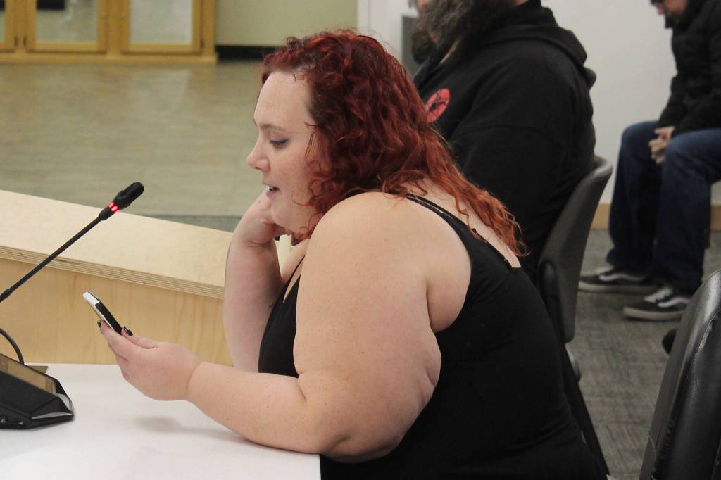 Iris Fontana, of the Satanic Temple, delivers an invocation during a Kenai Peninsula Borough Assembly meeting on Tuesday, Dec. 12, 2023, in Soldotna, Alaska. Fontana was the last person to deliver an assembly invocation before a new borough policy, which says only borough volunteer chaplains may deliver the invocation, takes effect. (Ashlyn OHara/Peninsula Clarion)