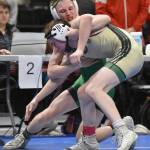 Sewards Ridge Conant works his way to a pin of Haines Hayden Jimenez in the Division II final at 112 pounds Saturday, Dec. 16, 2023, at the state wrestling tournament at the Alaska Airlines Center in Anchorage, Alaska. (Photo by Jeff Helminiak/Peninsula Clarion)