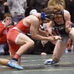 Easts Kenton Cooke wrestles to a 7-5 decision over Soldotnas MIchael Dickinson in the Division I title match at 140 pounds Saturday, Dec. 16, 2023, at the state wrestling tournament at the Alaska Airlines Center in Anchorage, Alaska. (Photo by Jeff Helminiak/Peninsula Clarion)