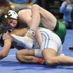 Sewards Hunter Forshee-Kurtz works his way to a pin of Tristan Tilden in the Division II title match at 130 pounds Saturday, Dec. 16, 2023, at the state wrestling tournament at the Alaska Airlines Center in Anchorage, Alaska. (Photo by Jeff Helminiak/Peninsula Clarion)
