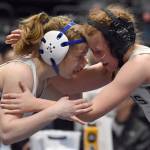 Soldotnas Rowan Peck wrestles her way to a 4-3 decision over Newhalens Pagan Lester in the girls title match at 120 pounds Saturday, Dec. 16, 2023, at the state wrestling tournament at the Alaska Airlines Center in Anchorage, Alaska. (Photo by Jeff Helminiak/Peninsula Clarion)