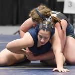 Homers Roane Cook works her way to a pin of Redingtons Nikayla Miller at 185 pounds at the girls tournament Saturday, Dec. 16, 2023, at the state wrestling tournament at the Alaska Airlines Center in Anchorage, Alaska. (Photo by Jeff Helminiak/Peninsula Clarion)