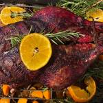 Roasted duck is served with rosemary and oranges. (Photo by Tressa Dale/Peninsula Clarion)