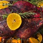 Roasted duck is served with rosemary and oranges. (Photo by Tressa Dale/Peninsula Clarion)