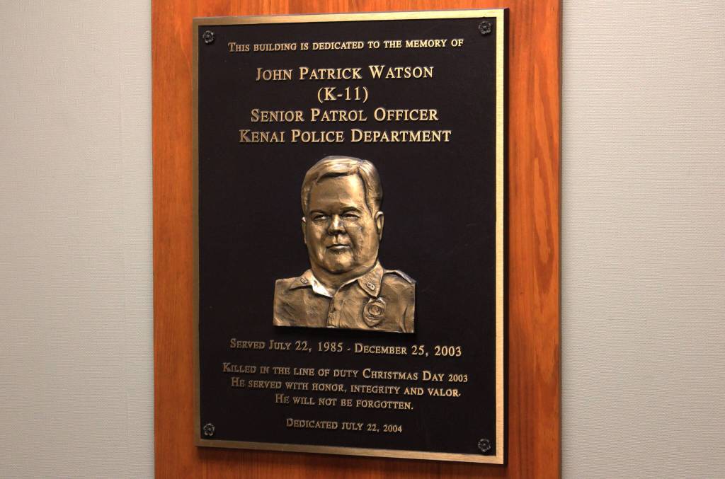 A memorial plaque honoring Officer John Watson is displayed inside the Kenai Police Department on Thursday, Dec. 28, 2023 in Kenai, Alaska. (Ashlyn OHara/Peninsula Clarion)