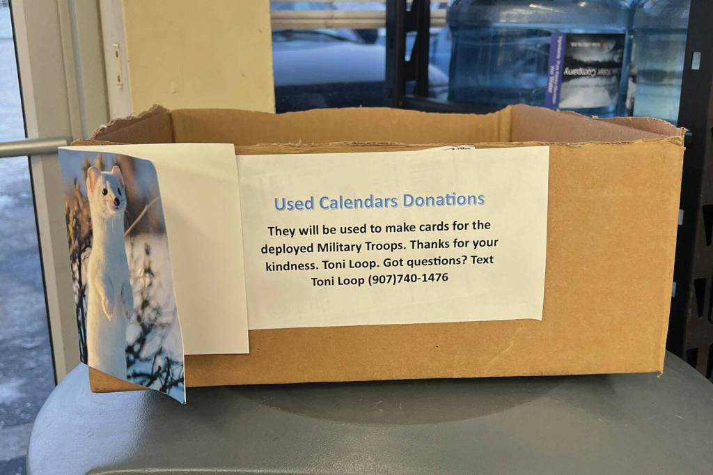 A donation box for used calendars is displayed at M&M Market in Nikiski on Wednesday.