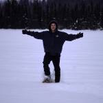 Nuno Venturi uses snowshoes to cross Headquarters Lake in the Kenai National Wildlife Refuge near Soldotna, Alaska, on Saturday, Jan. 6, 2024. (Jake Dye/Peninsula Clarion)