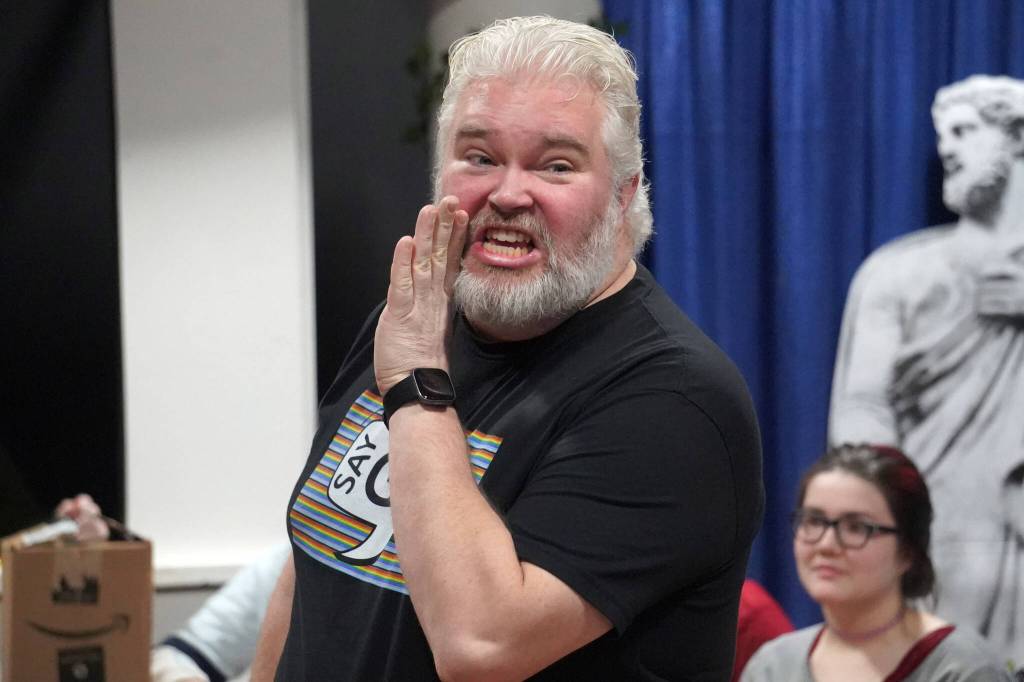David Brighton portrays Zeus during a rehearsal of Greece is the Word: The Zeusical at the Kenai Performers Theatre in Soldotna, Alaska, on Saturday, Jan. 6, 2024. (Jake Dye/Peninsula Clarion)