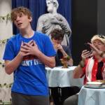 Gage Sturman portrays Narcissus and Todd Sherwood portrays Sparky Guy during a rehearsal of Greece is the Word: The Zeusical at the Kenai Performers Theatre in Soldotna, Alaska, on Saturday, Jan. 6, 2024. (Jake Dye/Peninsula Clarion)