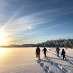 Snowshoers make fresh tracks on Headquarters Lake on a weekly guided walk at Kenai National Wildlife Refuge. (Photo by Leah Eskelin/USFWS)