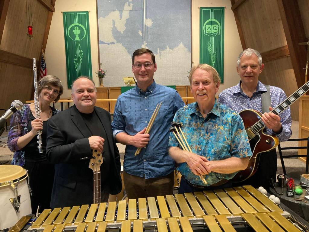 The 2022 lineup of John Dambergs Latin Jazz Quintet stand for a photo in 2022. John Damberg plays marimba and vibes, Mark Manners plays classical guitar, Bob Andrews plays bass guitar and Eiden Pospisil plays drums. Laura Koenig, pictured here with a flute, will not be playing with the quintet this weekend  the group will instead feature Karl Pasch on clarinet. (Photo courtesy John Damberg)
