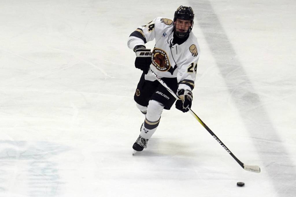 Kenai Rivers Luke Hause moves with the puck at the Soldotna Regional Sports Complex in Soldotna, Alaska, on Friday, Jan. 25, 2024. (Jake Dye/Peninsula Clarion)
