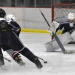 Soldotna goaltender Brycen Clyde prepares to save a shot by Kenai Centrals Logan Mese on Friday, Jan. 26, 2024, at the Kenai Multi-Purpose Facility in Kenai, Alaska. (Photo by Jeff Helminiak/Peninsula Clarion)