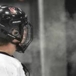Kenai Centrals Avery Martin exhales into the frigid air Friday, Jan. 26, 2024, at the Kenai Multi-Purpose Facility in Kenai, Alaska. (Photo by Jeff Helminiak/Peninsula Clarion)