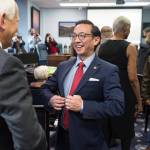 Sen. Scott Kawasaki, D-Fairbanks, gathers with other senators and families as they prepare for the opening of the Alaskas 31st Legislative Session on Tuesday, Jan. 15, 2019. (Michael Penn | Juneau Empire)