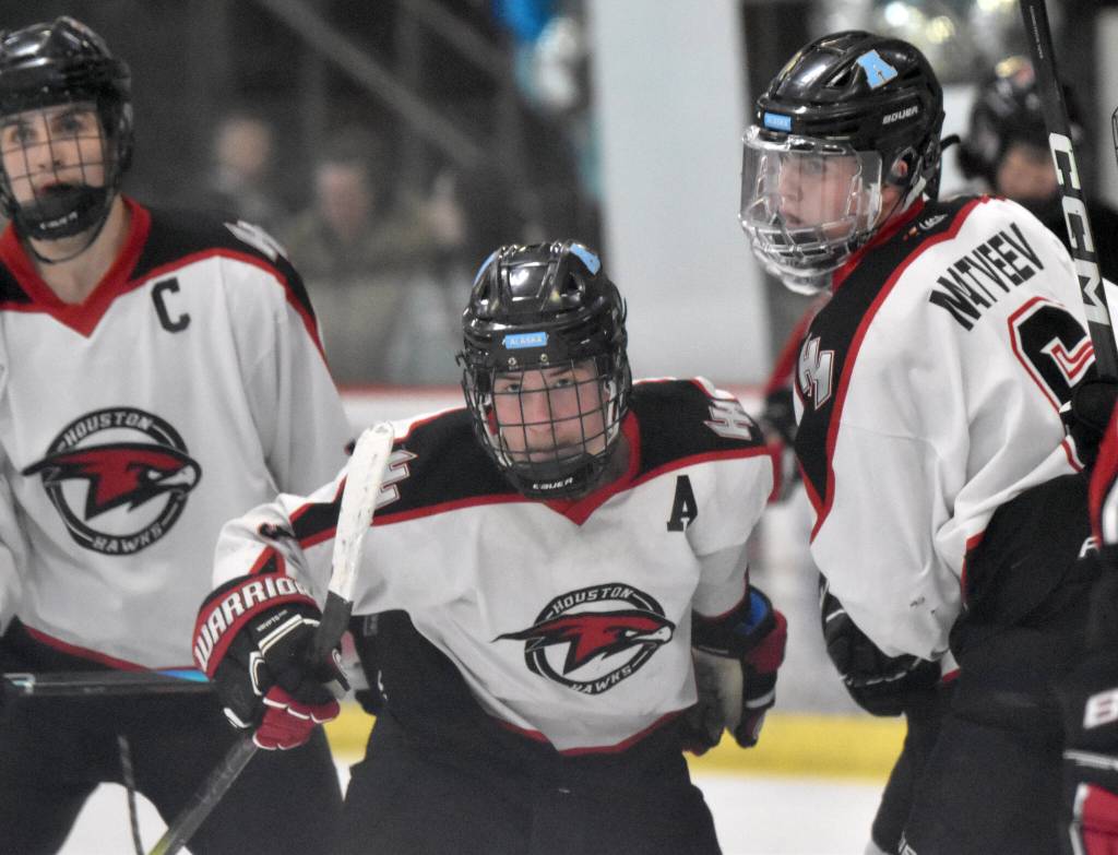 Houstons Brody Richard celebrates a goal with Daniel Matveev at the Division II state tournament Friday, Feb. 2, 2024, at the Soldotna Regional Sports Complex in Soldotna, Alaska. Both Richard and Matveev had hat tricks. (Photo by Jeff Helminiak/Peninsula Clarion)
