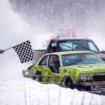 Ralph Mills clears the finish line in first place during the Mens Main Event race as part of Kenai Peninsula Ice Racing at the Decanter Inn in Kasilof, Alaska, on Sunday, Feb. 4, 2024. (Jake Dye/Peninsula Clarion)