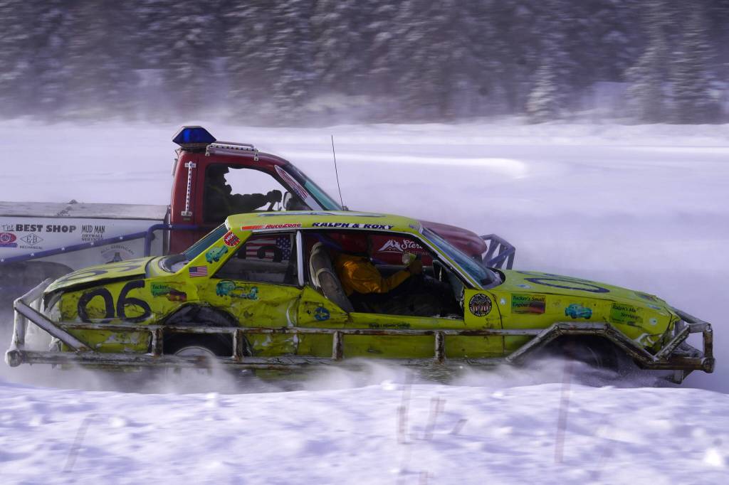 Brick Marcorelle and Ralph Mills battle for the lead during Kenai Peninsula Ice Racing at the Decanter Inn in Kasilof, Alaska, on Sunday, Feb. 4, 2024. (Jake Dye/Peninsula Clarion)
