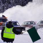 A tight pack of vehicles round the bend to complete a lap during Kenai Peninsula Ice Racing at the Decanter Inn in Kasilof, Alaska, on Sunday, Feb. 4, 2024. (Jake Dye/Peninsula Clarion)