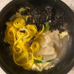 Meat- and vegetable-filled dumplings, fried eggs and nori stew in hot meat broth in this recipe for mandu-guk, or dumpling soup. (Photo by Tressa Dale/Peninsula Clarion)