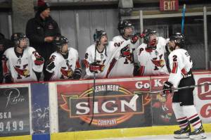 Kenai Central's Logan Mese celebrates after clinching the game with an empty-net goal Friday, Jan. 26, 2024, at the Kenai Multi-Purpose Facility in Kenai, Alaska. (Photo by Jeff Helminiak/Peninsula Clarion)