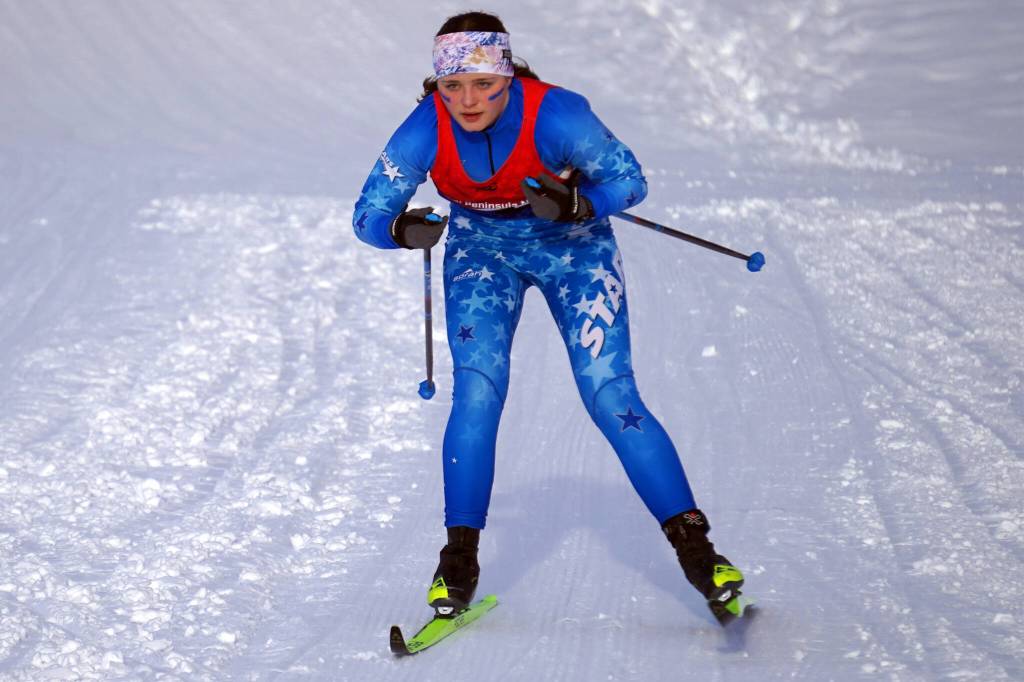 Soldotnas Ariana Cannava races towards the finish chute during the Region III Girls 7.5K Classic Race at Tsalteshi Trails near Soldotna, Alaska, on Saturday, Feb. 10, 2024. (Jake Dye/Peninsula Clarion)