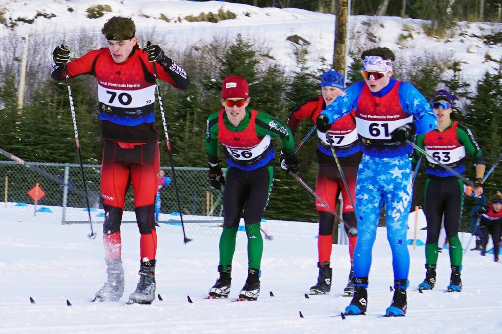 Kenai Centrals Greg Fallon and Soldotnas Michael Davidson battle to lead a pack of skiers during the Region III Boys 7.5K Classic Race at Tsalteshi Trails near Soldotna, Alaska, on Saturday, Feb. 10, 2024. (Jake Dye/Peninsula Clarion)