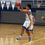 Cook Inlet Academys Lucas Oyoumick leaps to catch a pass during a basketball game at Cook Inlet Academy in Soldotna, Alaska, on Tuesday, Feb. 13, 2024. (Jake Dye/Peninsula Clarion)