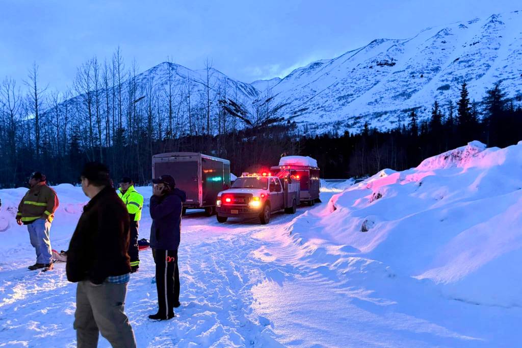 In this image provided by the Cooper Landing Emergency Services, emergency personnel respond to reports of an avalanche on Tuesday, Feb. 13, 2024, in Cooper Landing, Alaska. One backcountry skier died and two others were injured in an avalanche on Alaskas Kenai Peninsula, as warm weather raises the risk for such events in the state. (Clay Adam/Cooper Landing Emergency Services via AP)