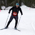 Travis Brown reaches the finish chute during the Tour of Tsalteshi at Tsalteshi Trails near Soldotna, Alaska, on Sunday, Feb. 18, 2024. (Jake Dye/Peninsula Clarion)