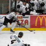 Kenai Rivers Landon MacDonald moves with the puck during a hockey game at the Soldotna Regional Sports Complex in Soldotna, Alaska, on Friday, Feb. 23, 2024. (Jake Dye/Peninsula Clarion)