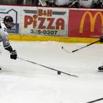 Kenai Rivers Luke Hause works to keep the puck from Fairbanks Brent Gulenchyn and Nik Gudmundson during a hockey game at the Soldotna Regional Sports Complex in Soldotna, Alaska, on Friday, Feb. 23, 2024. (Jake Dye/Peninsula Clarion)