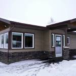 Snow falls atop the Central Peninsula Diabetes Center in Soldotna, Alaska, on Monday, Feb. 26, 2024. The office opened in October, but a grand opening was held this week. (Jake Dye/Peninsula Clarion)