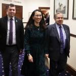 U.S. Rep. Mary Peltola (center) walks with Alaska Rep. Will Stapp, R-Fairbanks, and Alaska Sen. Lyman Hoffman, D-Bethel, into the Alaska House of Representatives chambers ahead of her annual address to the Alaska Legislature on Monday, Feb. 26, 2024 in Juneau, Alaska. (Mark Sabbatini/Juneau Empire)