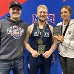 Dylan Dahlgren, Galen Brantley III and Adarra Hagelund at the NAIA Indoor Track and Field National Championships in Brookings, South Dakota. (Photo provided)