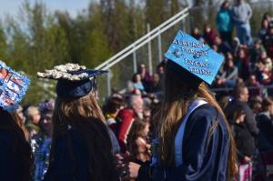Graduates wear decorated caps during Soldotna High Schools commencement ceremony on Wednesday, May 18, 2022, in Soldotna, Alaska. (Ashlyn OHara/Peninsula Clarion)