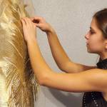 Sara DeVolld works on Towards the Sun, a dress she designed that was featured in Februarys Trend Alaska 2024 Fashion Show. (Photo provided by Shona DeVolld)