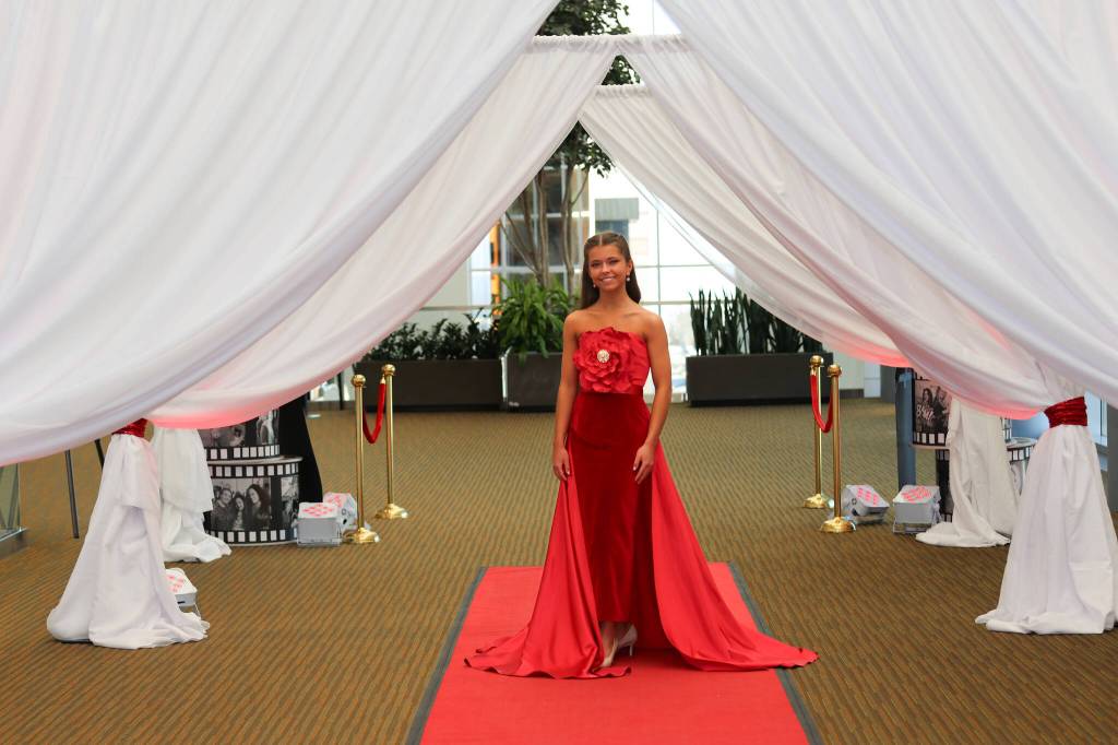 Sara DeVolld wears Heartlight, a dress she designed that was featured in this years Alaskas Red Dress Collection. (Photo provided by Shona DeVolld)