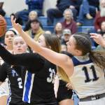 Palmers Kaelyn Downey and Soldotnas Juliet Innes battle for the ball Thursday, March 7, 2024, at the Northern Lights Conference tournament at Soldotna High School in Soldotna, Alaska. (Photo by Jeff Helminiak/Peninsula Clarion)