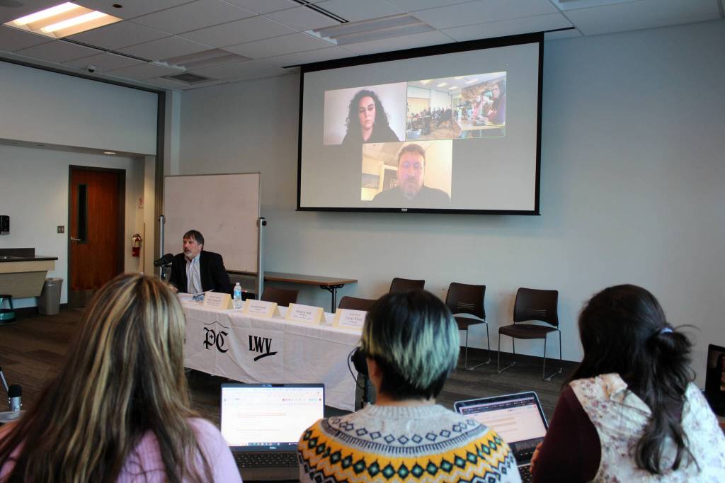 Michael Jones, Louie Flora and Crystal Schwartz participate in a candidate forum for the Homer Electric Association Board of Directors hosted by KDLL 91.9 FM, KBBI AM 890 and the Peninsula Clarion at the Soldotna Public Library in Soldotna, Alaska, on Monday, March 18, 2024. (Jake Dye/Peninsula Clarion)