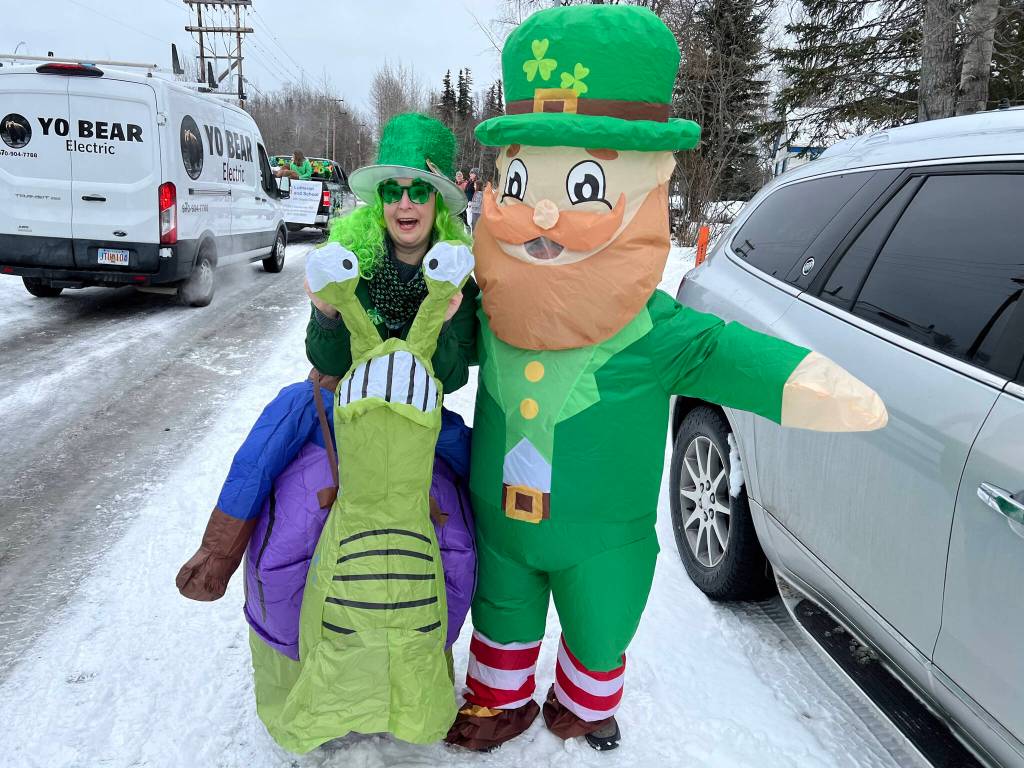 Sara Hondel stands with a leprechaun during the Sweeneys St. Patricks Day Parade in Soldotna, Alaska, on Sunday, March 17, 2024. (Photo provided by Sara Hondel)