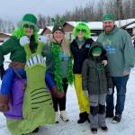 Soldotna Chamber of Commerce staff are decked out in green for the Sweeneys St. Patricks Day Parade in Soldotna, Alaska, on Sunday, March 17, 2024. (Photo provided by Soldotna Chamber of Commerce)